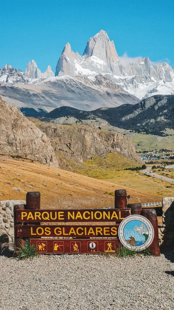 sign with mountain peaks in background Los Glaciares National Park beast places to visit argentina