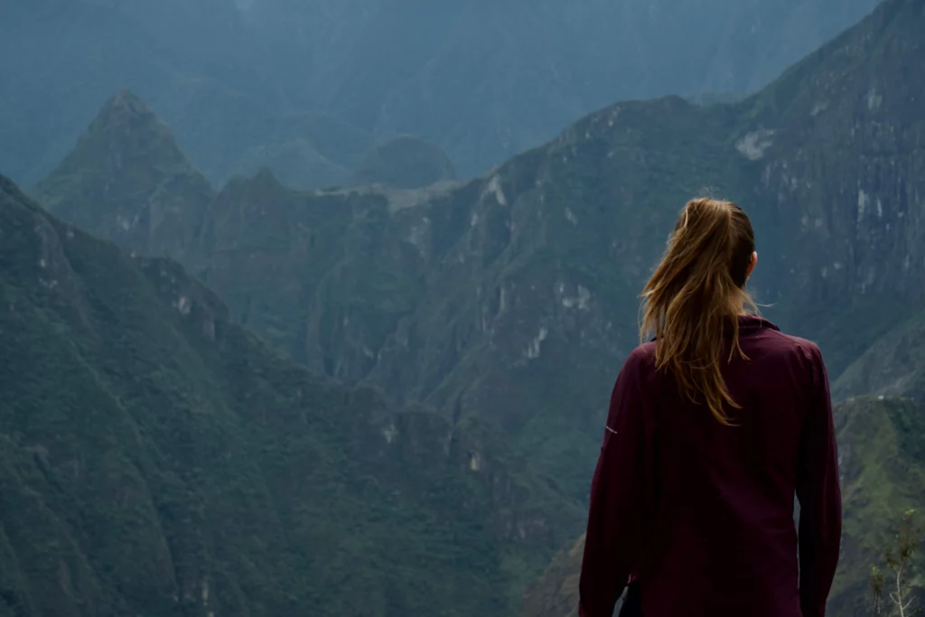 person looking at mountains peru