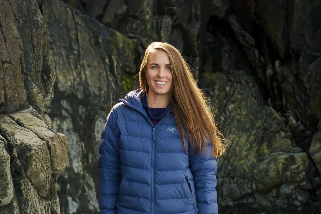 brooke on foot wearing blue puffy coat