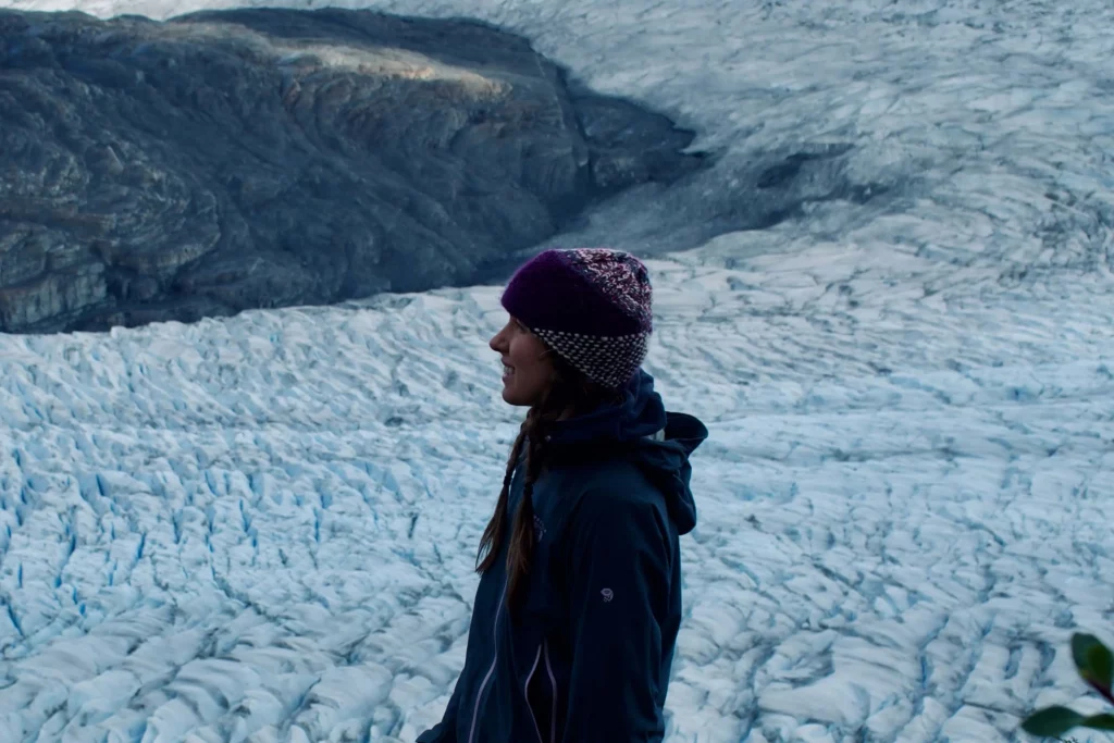 woman cold weather hiking glacier patagonia