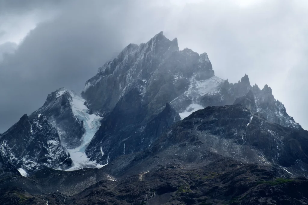 snow capped mountain rocks andes torres del paine patagonia