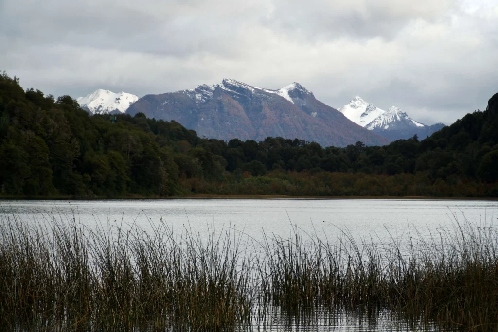lake in foreground snowy mountains in background