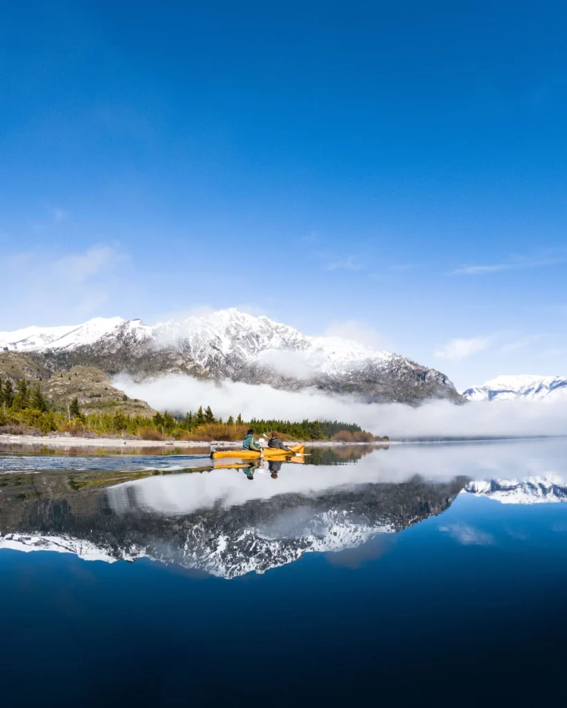 kayak lake snowy mountains bariloche patagonia