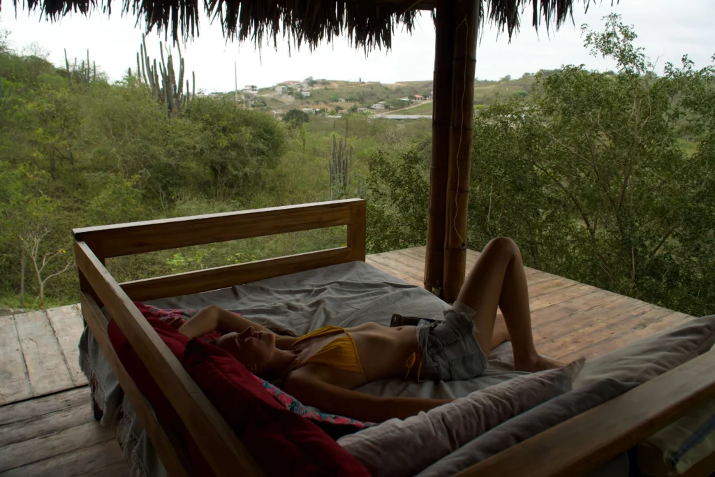 woman laying on daybed ecuador