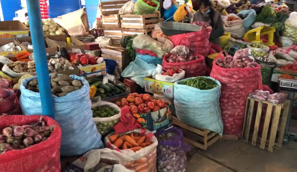 fresh produce market bags of tomatoes and potatoes