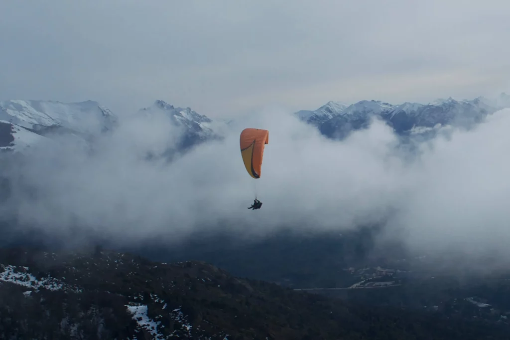 paragliding with the andes mountains in the background