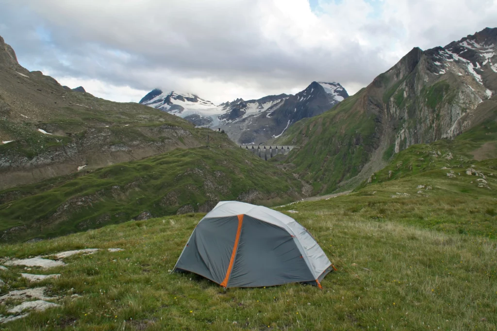 tent with snowy mountain in the background
