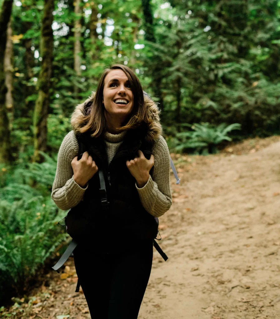 woman hiking pnw smiling